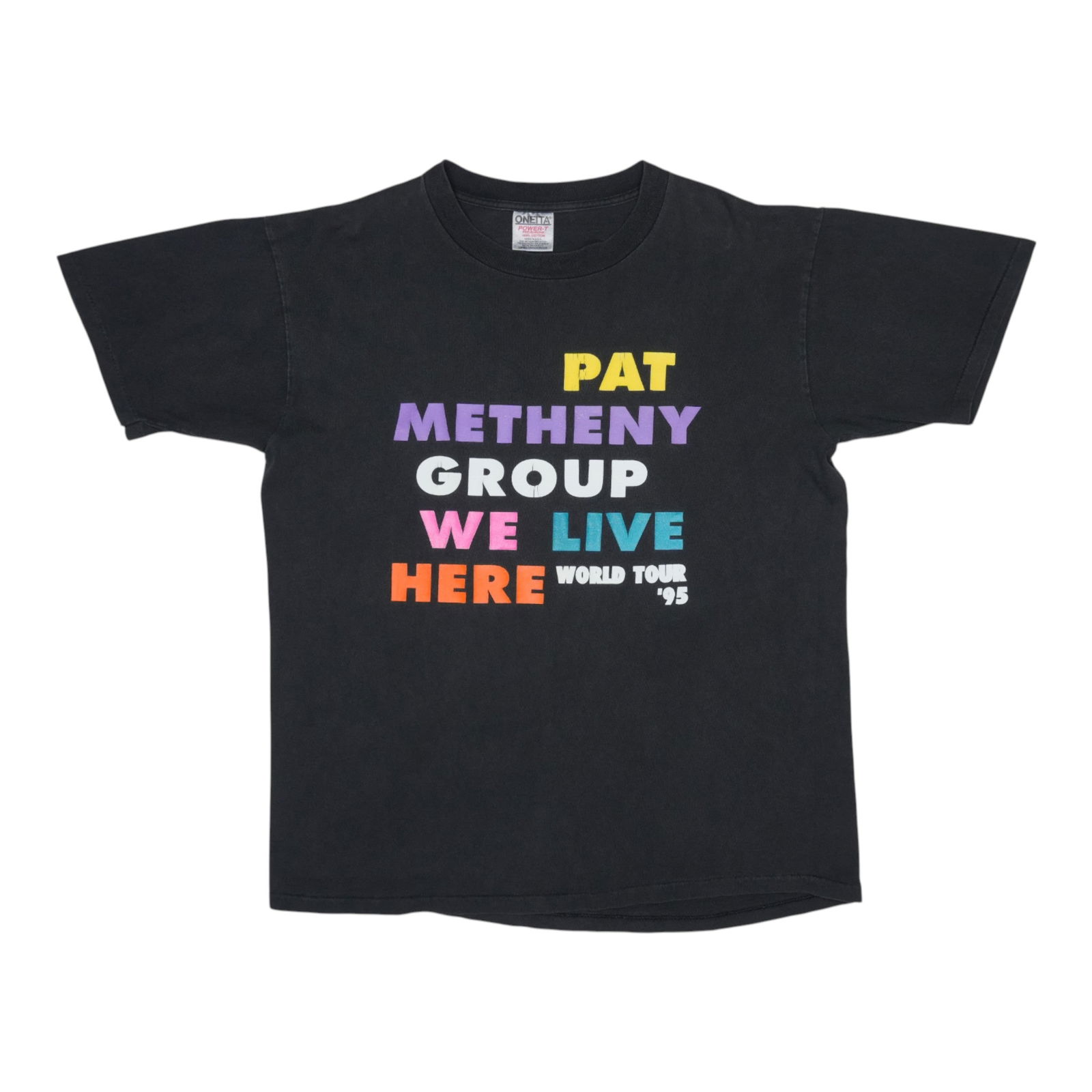 Vintage 1995 Pat Methany Group We Live Here Tour Black Cotton T-Shirt: Vintage 1995 Pat Methany Group We Live Here Tour Black Cotton T-Shirt This is an original vintage 1995 Pat Metheny Group 'We Live Here' World Tour shirt. Featuring front and back graphics, the shirt i