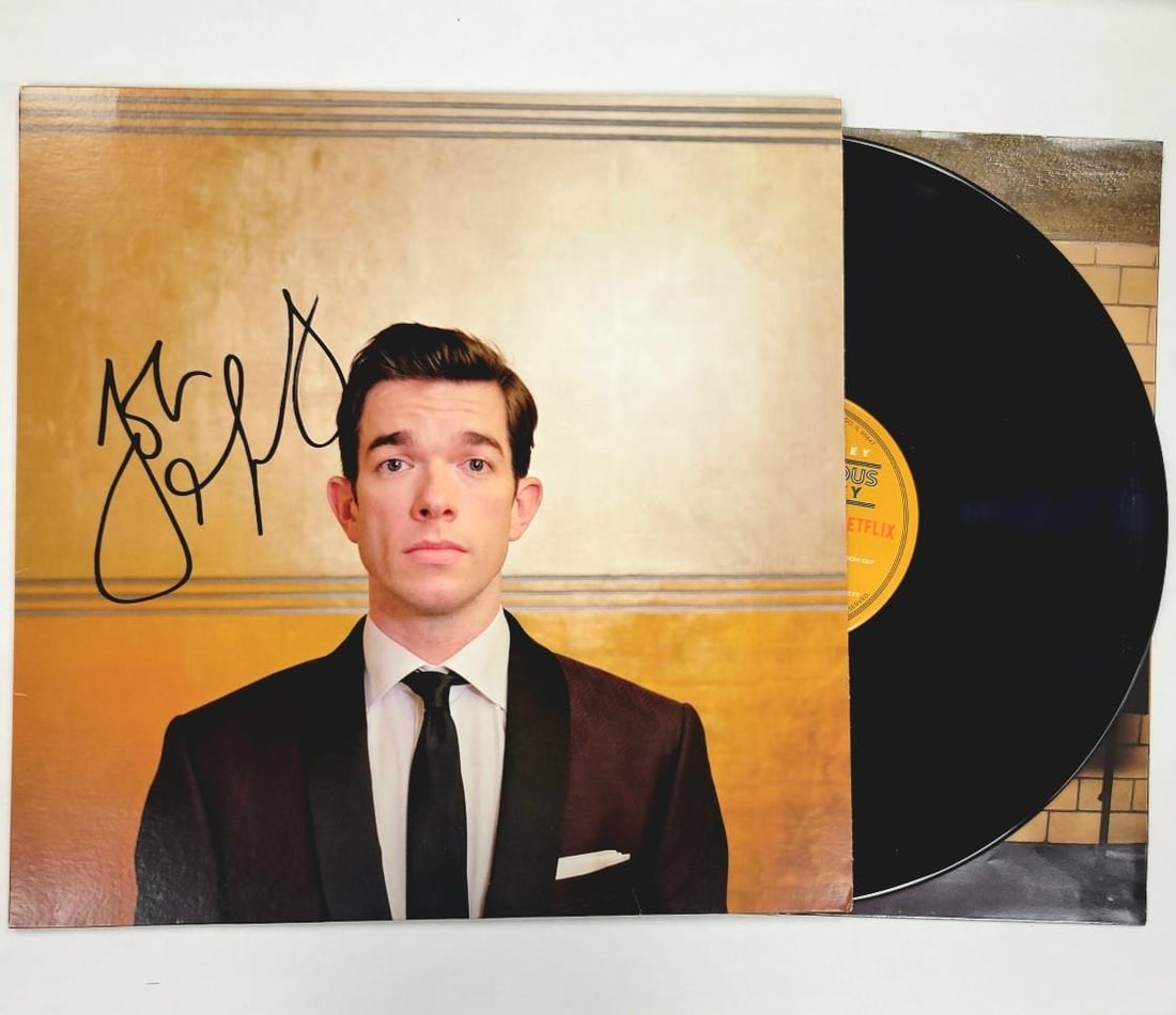 Kid Gorgeous at Radio City LP Cover Signed by John Mulaney Beckett Authenticated: Kid Gorgeous at Radio City LP Cover Signed by John Mulaney Beckett Authenticated This is an original Kid Gorgeous at Radio City LP cover, personally signed by John Mulaney. The autograph is authentica