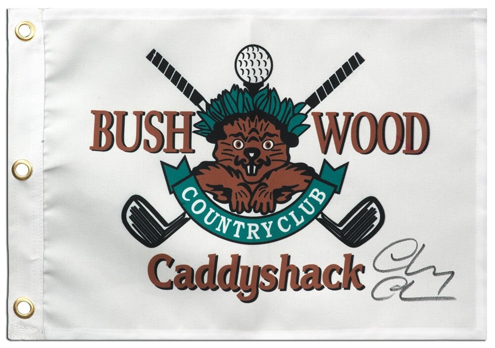 Chevy Chase Signed Caddyshack Bushwood Golf Pin Flag 18x13 with COA: Chevy Chase Signed Caddyshack Bushwood Golf Pin Flag 18x13 with COA This original Caddyshack Bushwood golf pin flag measures 18x13 inches and features the iconic Caddy Shack movie beaver logo. It is s