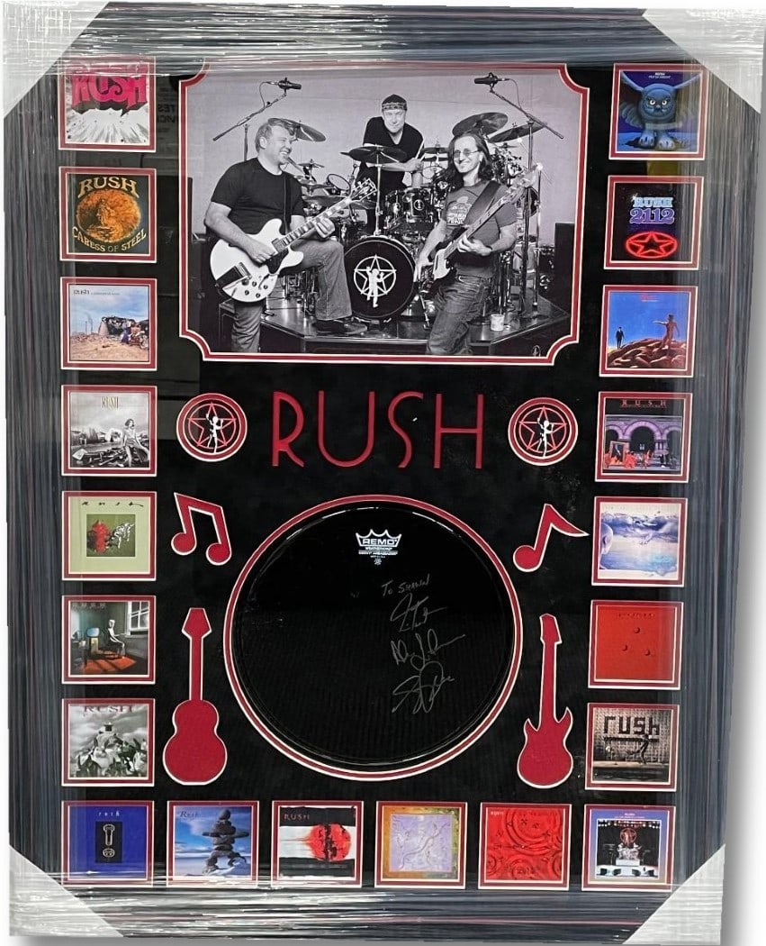 Rush Band Autographed Drumhead Framed Geddy Lee Neil Peart Alex Lifeson JSA: Rush Band Autographed Drumhead Framed Geddy Lee Neil Peart Alex Lifeson JSA This original Rush band autographed drumhead features signatures from legendary members Geddy Lee, Neil Peart, and Alex Life