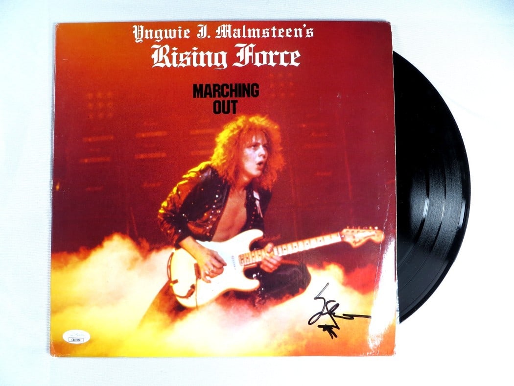 Yngwie Malmsteen Autographed Album Cover JSA Certified Rock Collectible: Yngwie Malmsteen Autographed Album Cover JSA Certified Rock Collectible This Yngwie Malmsteen signed autographed record album cover is a must-have for any fan of the legendary guitarist. It features t