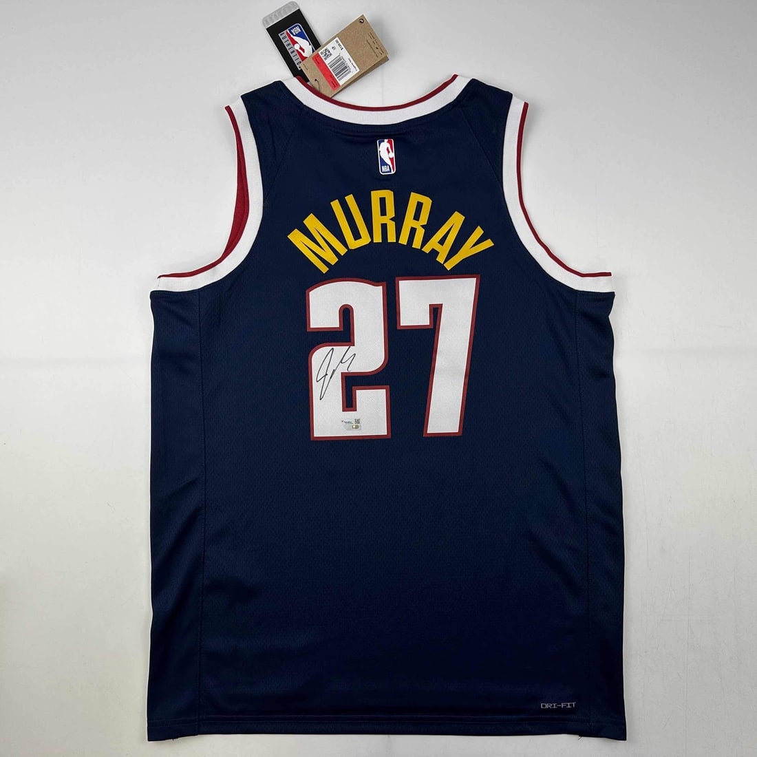 Jamal Murray Signed Denver Nuggets Blue Swingman Jersey Fanatics COA: Jamal Murray Signed Denver Nuggets Blue Swingman Jersey Fanatics COA This authentic blue swingman jersey, signed by Jamal Murray, showcases his dedication to the Denver Nuggets. The jersey comes with