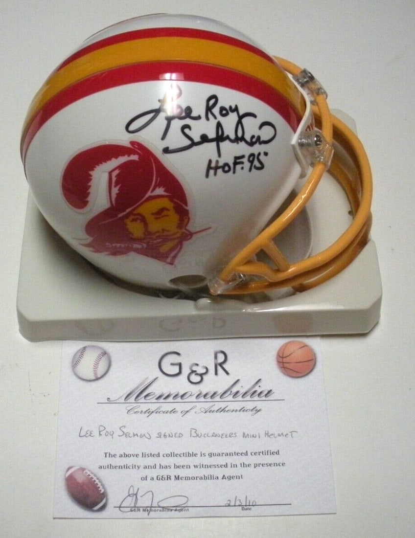 Lee Roy Selmon Signed Mini Helmet Tampa Bay Buccaneers with COA: Lee Roy Selmon Signed Mini Helmet Tampa Bay Buccaneers with COA This signed mini helmet commemorates Lee Roy Selmon, a legendary player for the Tampa Bay Buccaneers and the Oklahoma Sooners. It comes