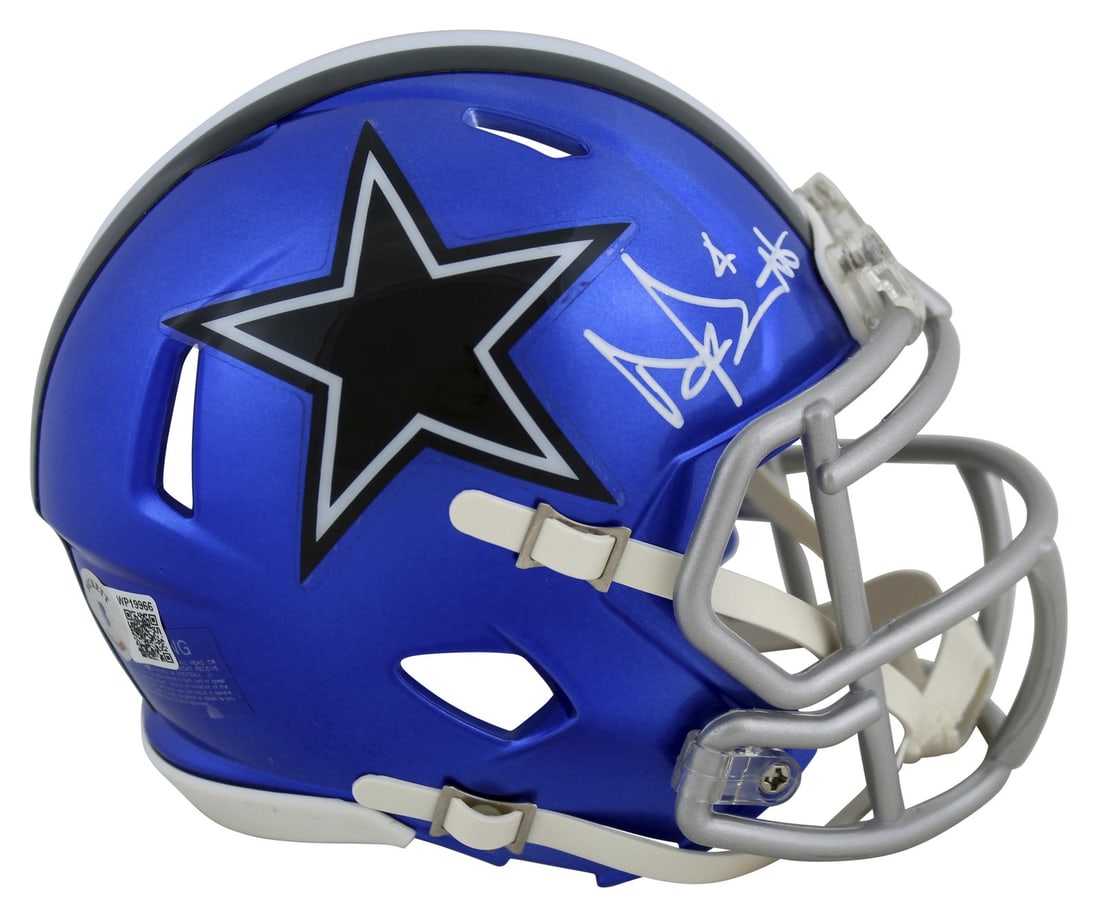 Dak Prescott Signed Dallas Cowboys Flash Speed Mini Helmet BAS Witnessed: Dak Prescott Signed Dallas Cowboys Flash Speed Mini Helmet BAS Witnessed This authentic mini helmet features the signature of Dak Prescott, quarterback for the Dallas Cowboys. The helmet is an alterna