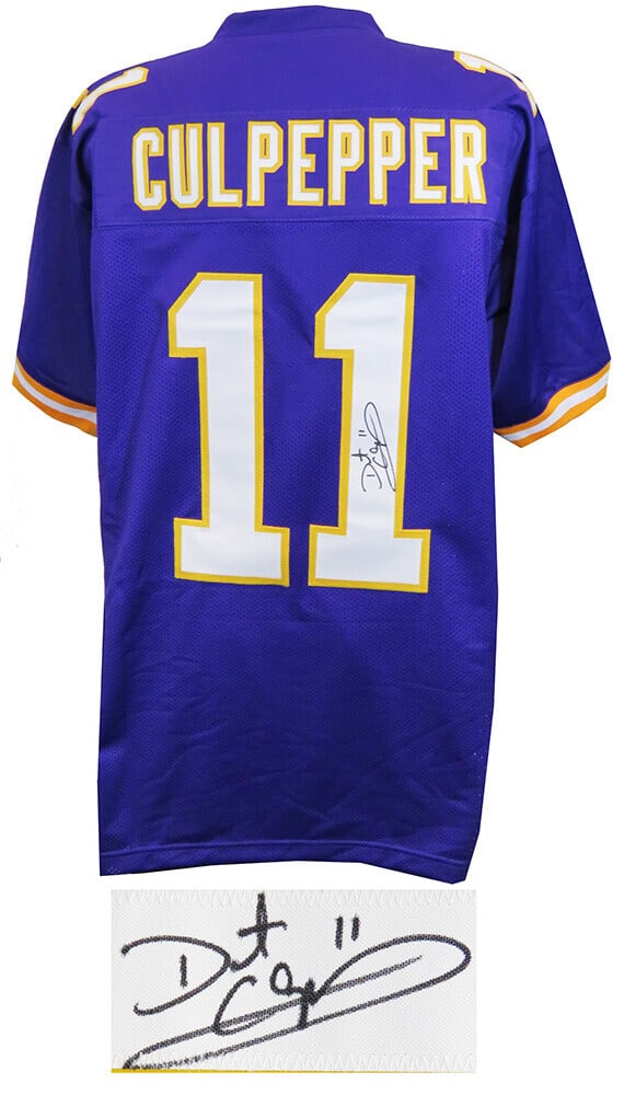 Daunte Culpepper Signed Purple Throwback Jersey with COA Minnesota Vikings: Daunte Culpepper Signed Purple Throwback Jersey with COA Minnesota Vikings This is a signed purple throwback custom football jersey from Daunte Culpepper, a celebrated player of the Minnesota Vikings.