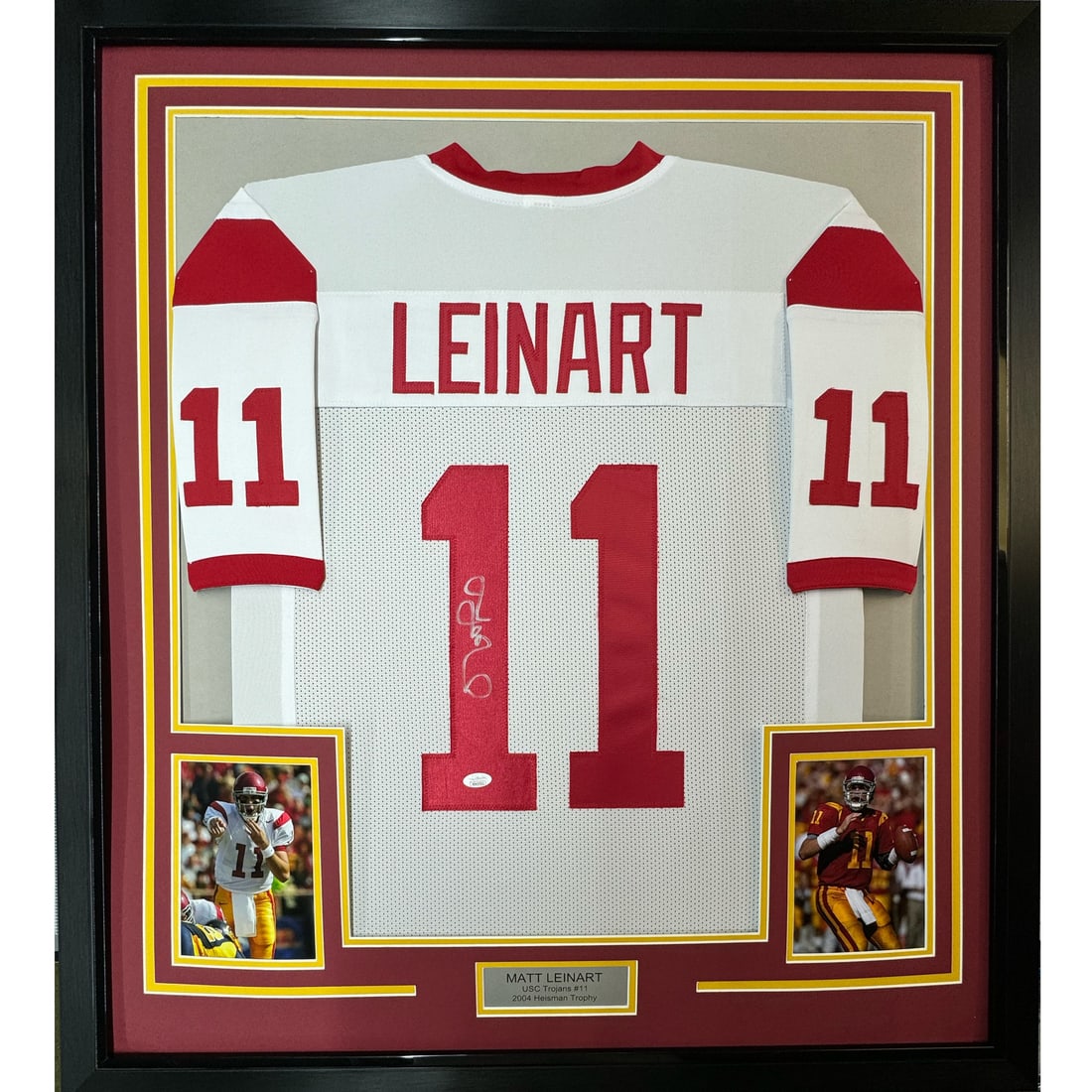 Framed Matt Leinart Autographed USC Jersey with JSA COA 35x39: Framed Matt Leinart Autographed USC Jersey with JSA COA 35x39 Celebrate the legacy of Matt Leinart with this professionally framed autographed USC Trojans white football jersey. Measuring 35 inches by