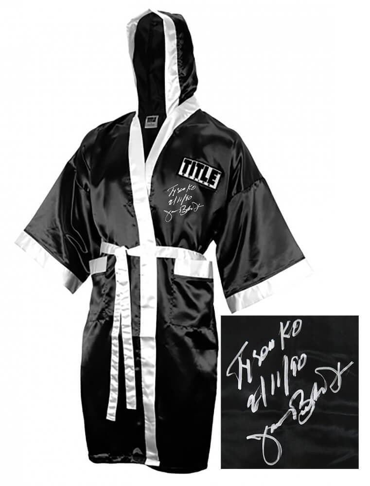 James Buster Douglas Signed Boxing Robe with Tyson KO Inscription: James Buster Douglas Signed Boxing Robe with Tyson KO Inscription This James Buster Douglas signed black boxing robe is a remarkable piece of sports memorabilia. The robe features the inscription 'Tys