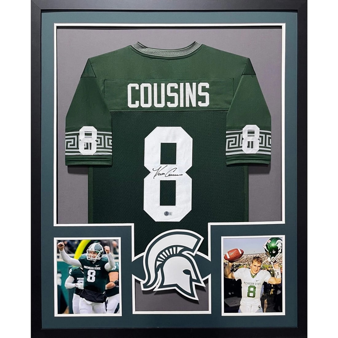 Kirk Cousins Framed Autographed Jersey Beckett Authenticated Michigan State: Kirk Cousins Framed Autographed Jersey Beckett Authenticated Michigan State This striking framed jersey features the autograph of Kirk Cousins, a standout player from Michigan State. Authenticated by