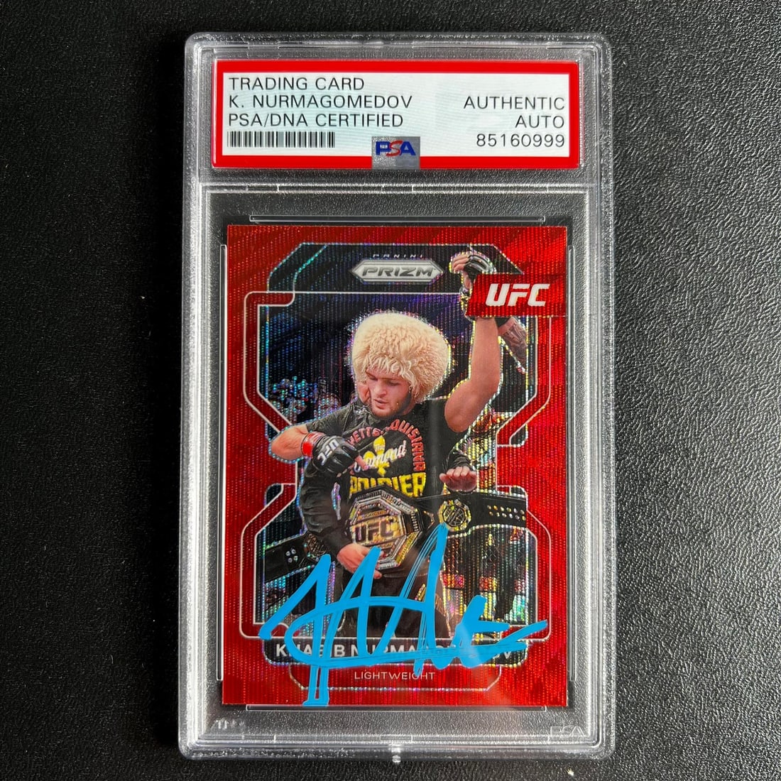 2022 Panini Prizm Khabib Nurmagomedov Signed Card PSA Authenticated Red Prism: 2022 Panini Prizm Khabib Nurmagomedov Signed Card PSA Authenticated Red Prism This is a 2022 Panini Prizm #196 sports trading card featuring Khabib Nurmagomedov, a celebrated athlete in the Ultimate F