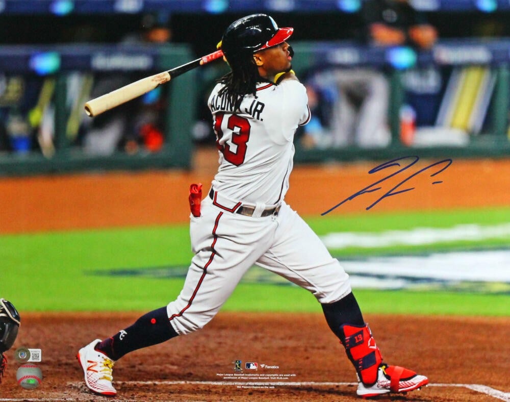 Ronald Acuna Signed 16x20 Braves Photo Beckett Authenticated: Ronald Acuna Signed 16x20 Braves Photo Beckett Authenticated This original 16x20 photograph features Ronald Acuna of the Atlanta Braves, showcasing his iconic long hair during a batting moment. The ph