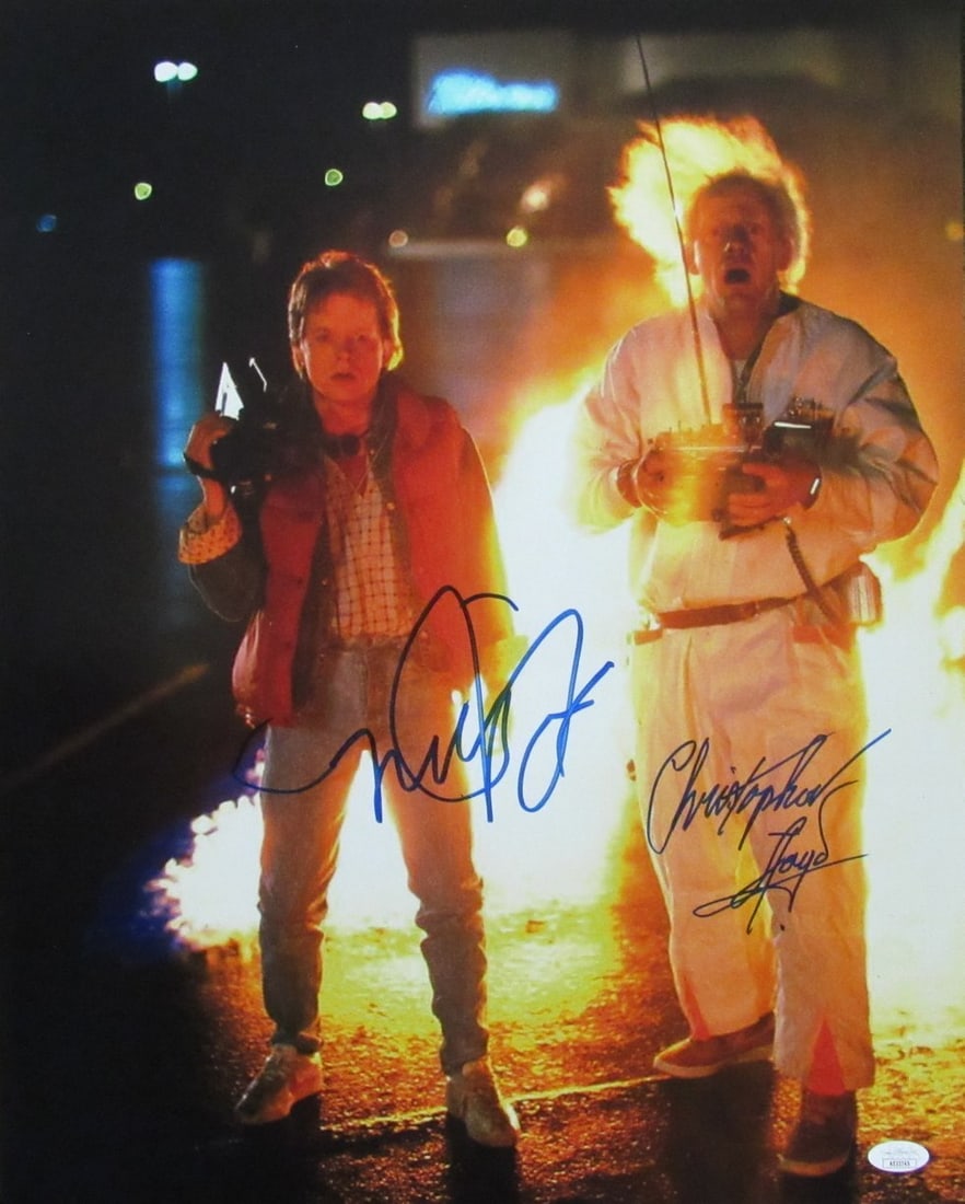 Michael J Fox Christopher Lloyd Signed 16x20 Back to the Future Photo JSA Certified: Michael J Fox Christopher Lloyd Signed 16x20 Back to the Future Photo JSA Certified This is an original 16x20 photo from the iconic film "Back to the Future," autographed by stars Michael J. Fox and C