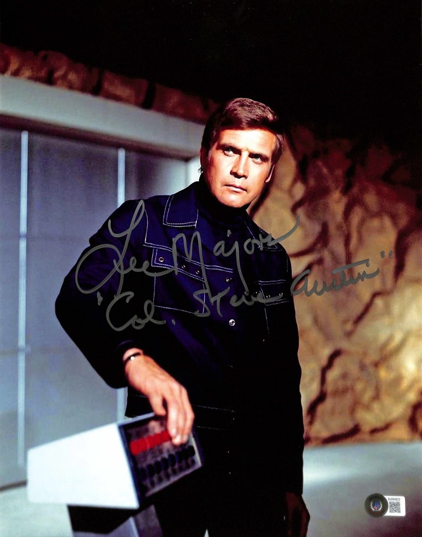 Lee Majors Signed 11x14 Photo Six Million Dollar Man Beckett Certified: Lee Majors Signed 11x14 Photo Six Million Dollar Man Beckett Certified This is an original, signed 11x14 photograph of Lee Majors, renowned for his role as "Steve Austin" in the iconic TV series "Six