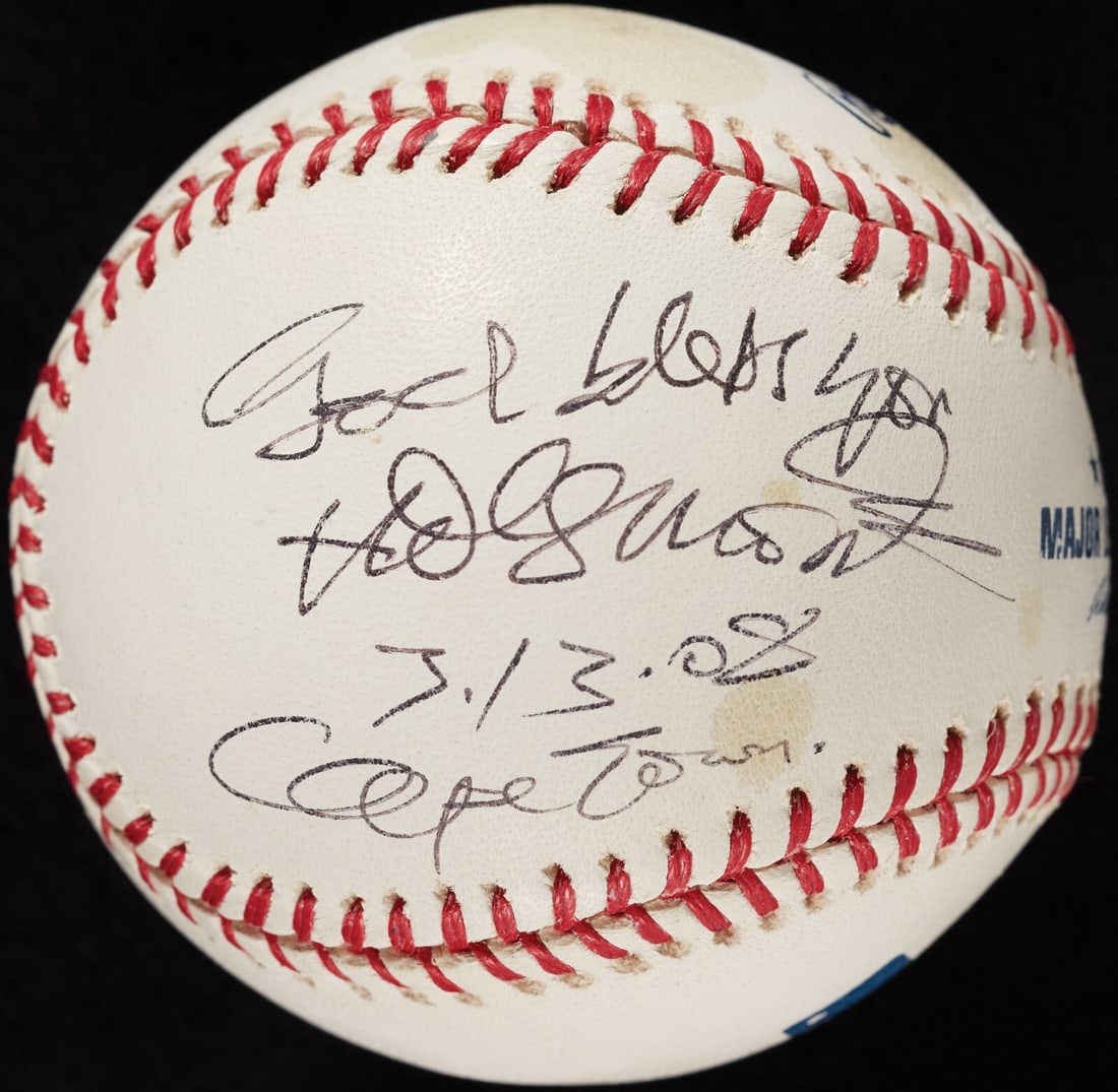 Desmond Tutu Autographed MLB Baseball with PSA DNA COA: Desmond Tutu Autographed MLB Baseball with PSA DNA COA This authentic Major League Baseball is signed by the renowned South African leader, Desmond Tutu, in elegant black ink. The ball features the in