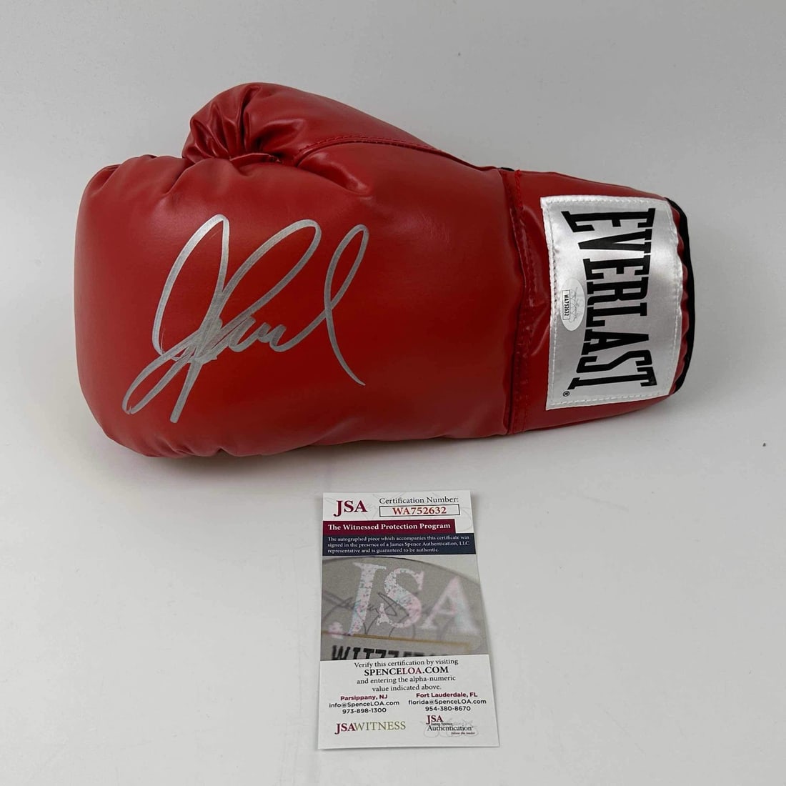 Jake Paul Autographed Red Everlast Boxing Glove JSA COA: Jake Paul Autographed Red Everlast Boxing Glove JSA COA This is an authentic autographed red Everlast boxing glove signed by athlete Jake Paul. The item comes with a James Spence Authentication (JSA)
