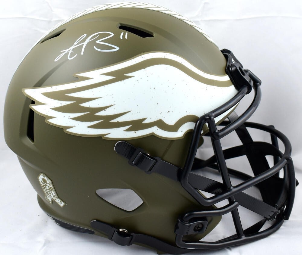 A.J. Brown Signed Philadelphia Eagles Speed Helmet Beckett Authenticated: A.J. Brown Signed Philadelphia Eagles Speed Helmet Beckett Authenticated This is a full-size salute to service speed helmet signed by AJ Brown, showcasing his commitment to the Philadelphia Eagles. Th