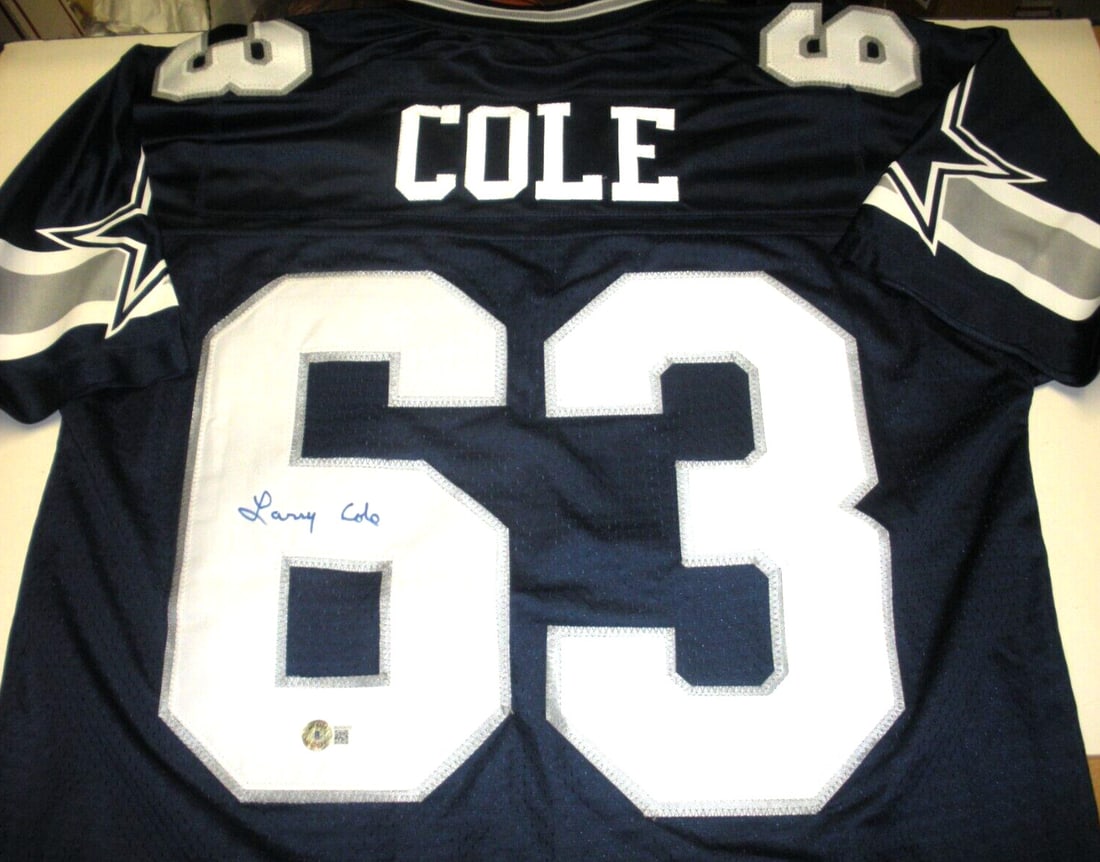 Larry Cole Signed Dallas Cowboys Proline Jersey with Beckett COA: Larry Cole Signed Dallas Cowboys Proline Jersey with Beckett COA Show your support for the Dallas Cowboys with this officially licensed Proline jersey, signed by Larry Cole. This pre-owned jersey is a