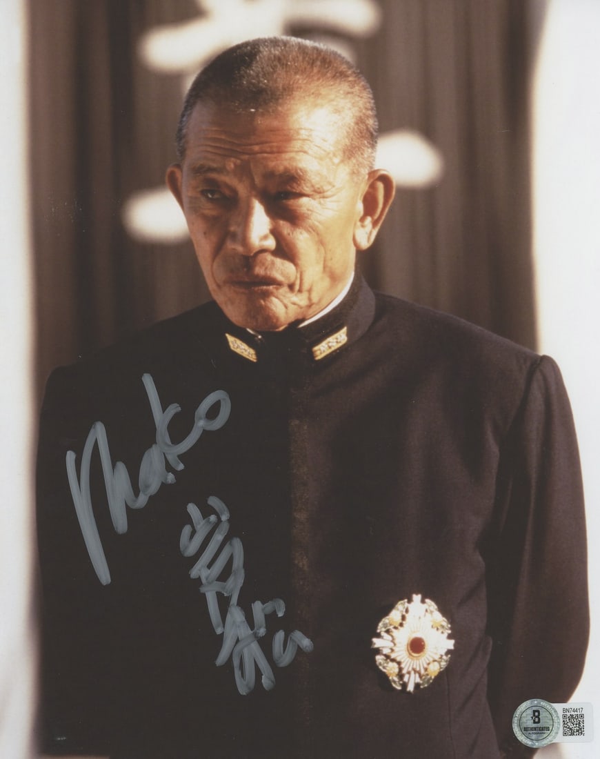 Mako Signed Pearl Harbor 8x10 Photo with Beckett Authentication BAS BN74417: Mako Signed Pearl Harbor 8x10 Photo with Beckett Authentication BAS BN74417 This authentic 8x10 photograph features the signature of Mako, renowned for his role in Pearl Harbor. The photo is certified