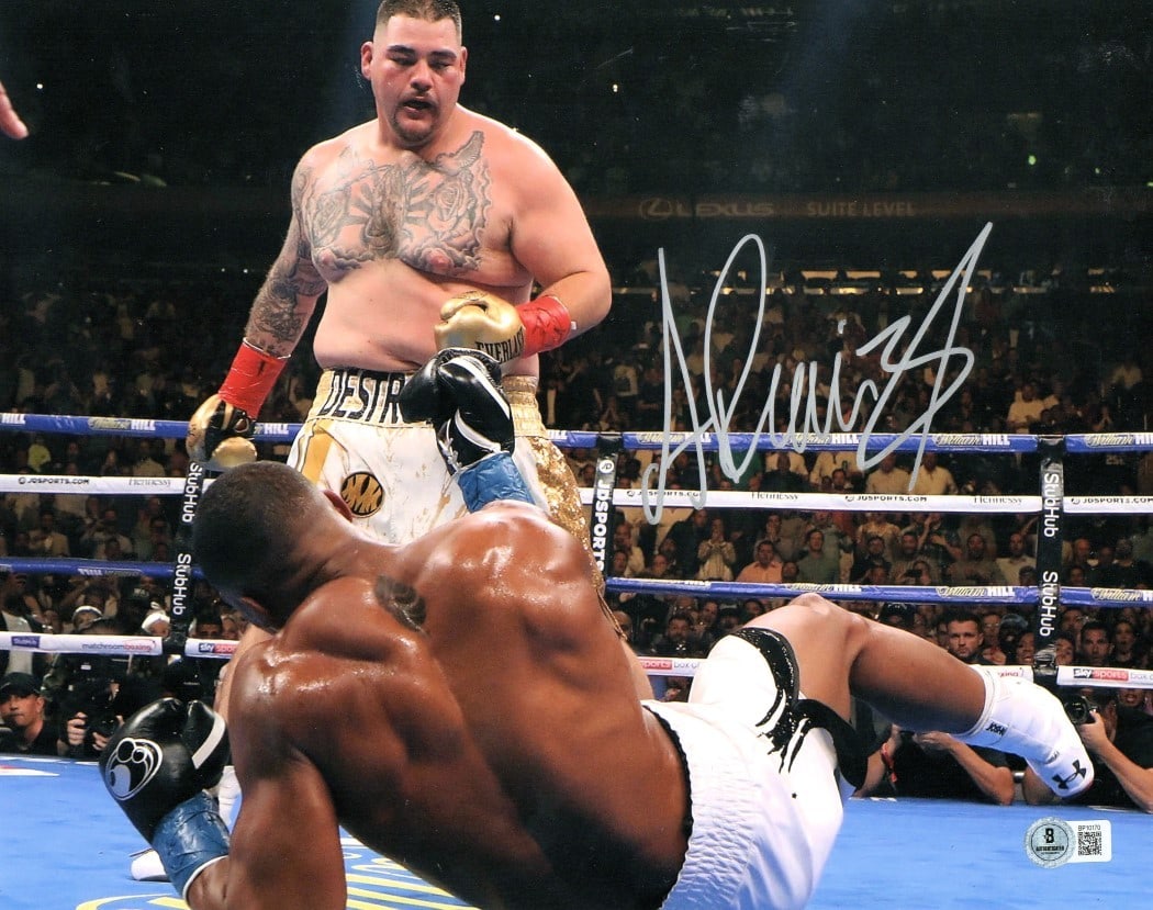 Andy Ruiz Jr. Autographed 11x14 Boxing Photo Beckett Authenticated: Andy Ruiz Jr. Autographed 11x14 Boxing Photo Beckett Authenticated Capture a moment from boxing history with this autographed 11X14 photo of Andy Ruiz Jr., showcasing his triumphant post-knockout expr
