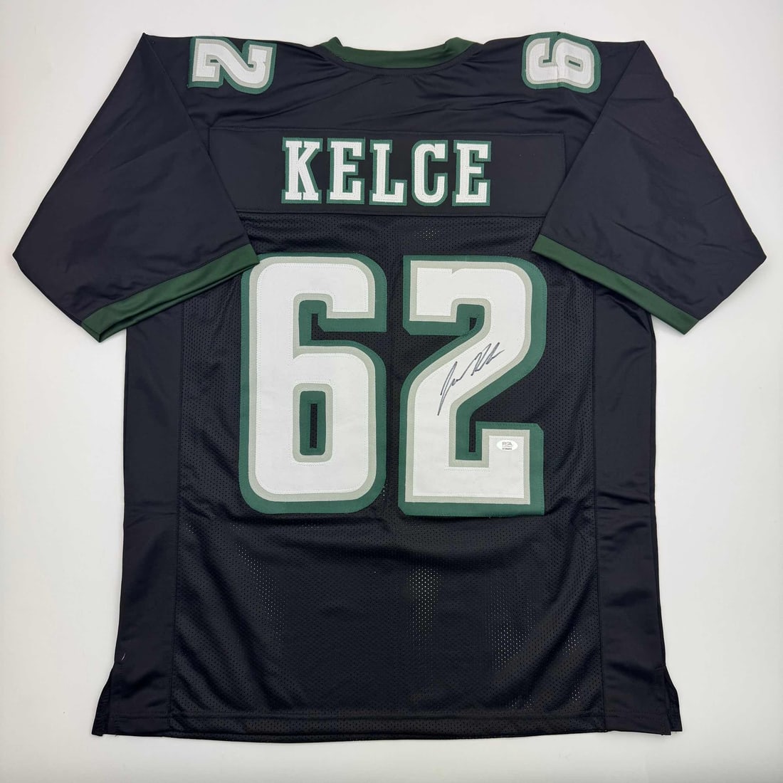 Autographed Jason Kelce Black Jersey Philadelphia Eagles JSA Certified: Autographed Jason Kelce Black Jersey Philadelphia Eagles JSA Certified Elevate your memorabilia collection with this autographed Jason Kelce Philadelphia Black Football Jersey. This custom jersey feat