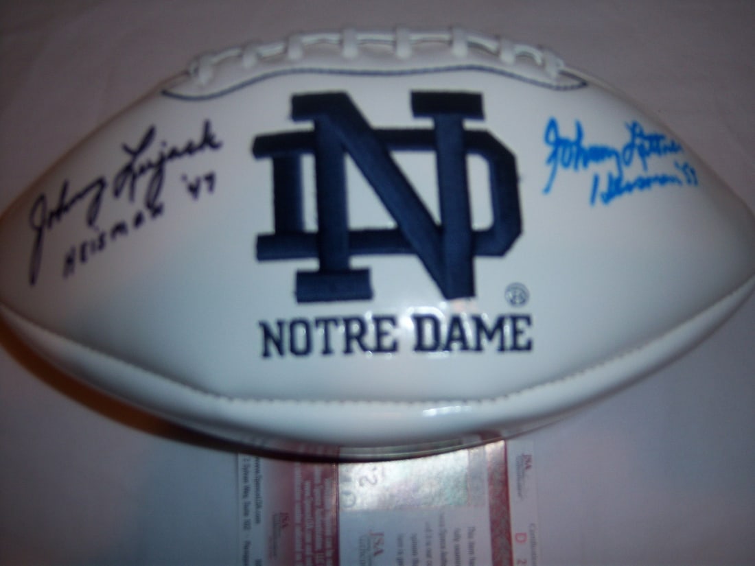 Johnny Lujack Johnny Lattner Signed Football Notre Dame JSA COA: Johnny Lujack Johnny Lattner Signed Football Notre Dame JSA COA This is an original signed football featuring the autographs of Johnny Lujack and Johnny Lattner. Both players are Notre Dame legends, w