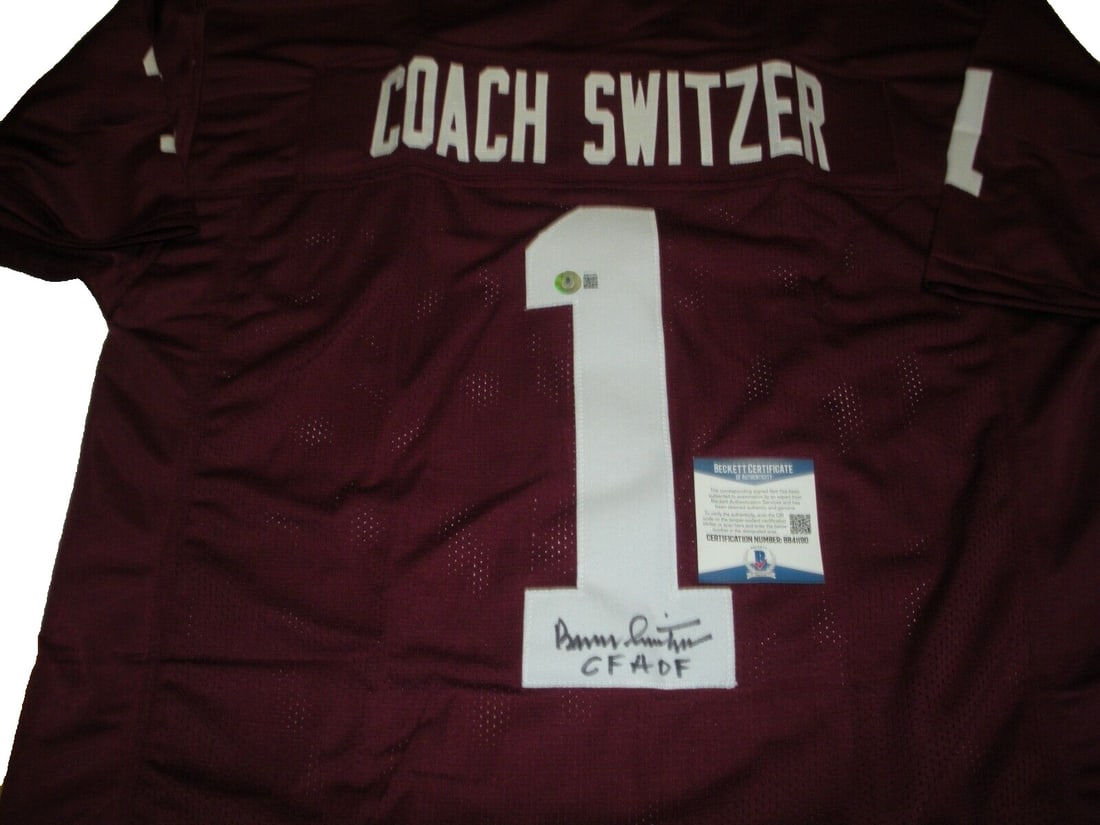 Barry Switzer Oklahoma Sooners Signed Jersey Beckett COA: Barry Switzer Oklahoma Sooners Signed Jersey Beckett COA This is an authentic Barry Switzer signed jersey representing the Oklahoma Sooners, a notable piece for any football enthusiast. It is certifie