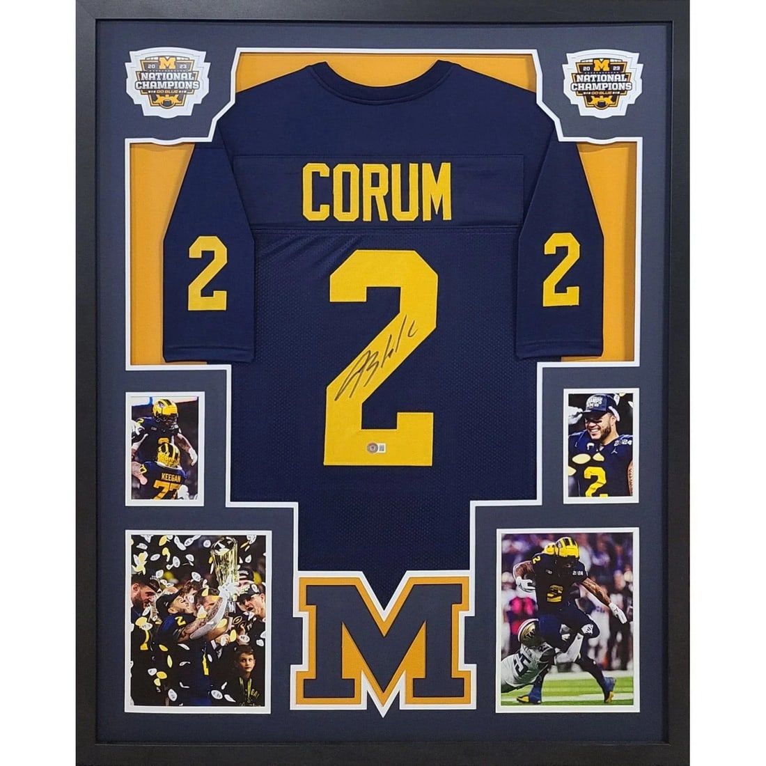 Blake Corum Signed Framed Jersey Beckett Authenticated Michigan Championship: Blake Corum Signed Framed Jersey Beckett Authenticated Michigan Championship Celebrate Michigan's championship legacy with this stunning autographed Blake Corum framed jersey. This unique piece featur
