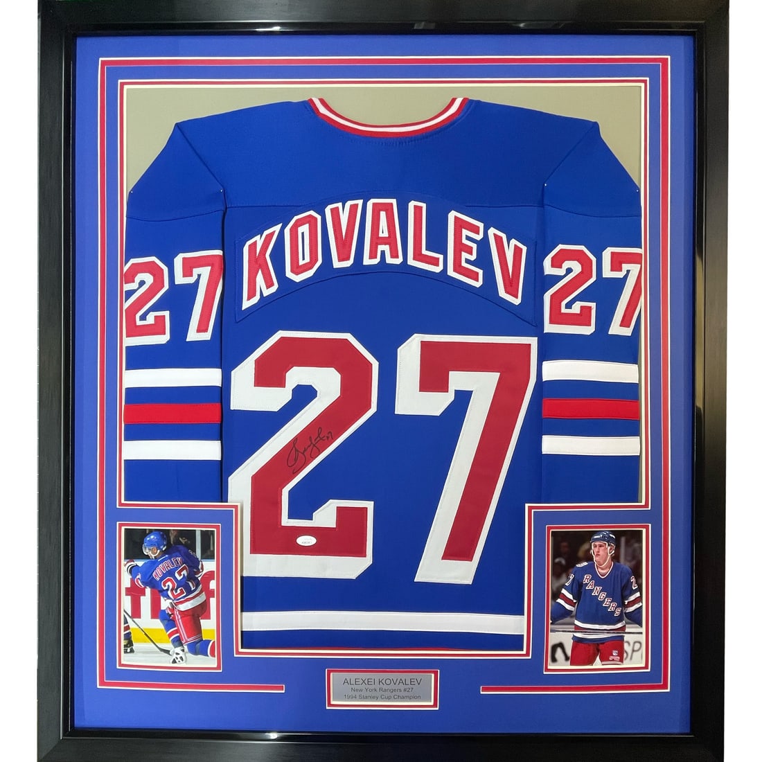 Framed Alexei Kovalev Signed Jersey New York Rangers JSA COA 33x42: Framed Alexei Kovalev Signed Jersey New York Rangers JSA COA 33x42 This framed collectible features an autographed Alexei Kovalev jersey, showcasing the New York Rangers' blue colors. The jersey is pr