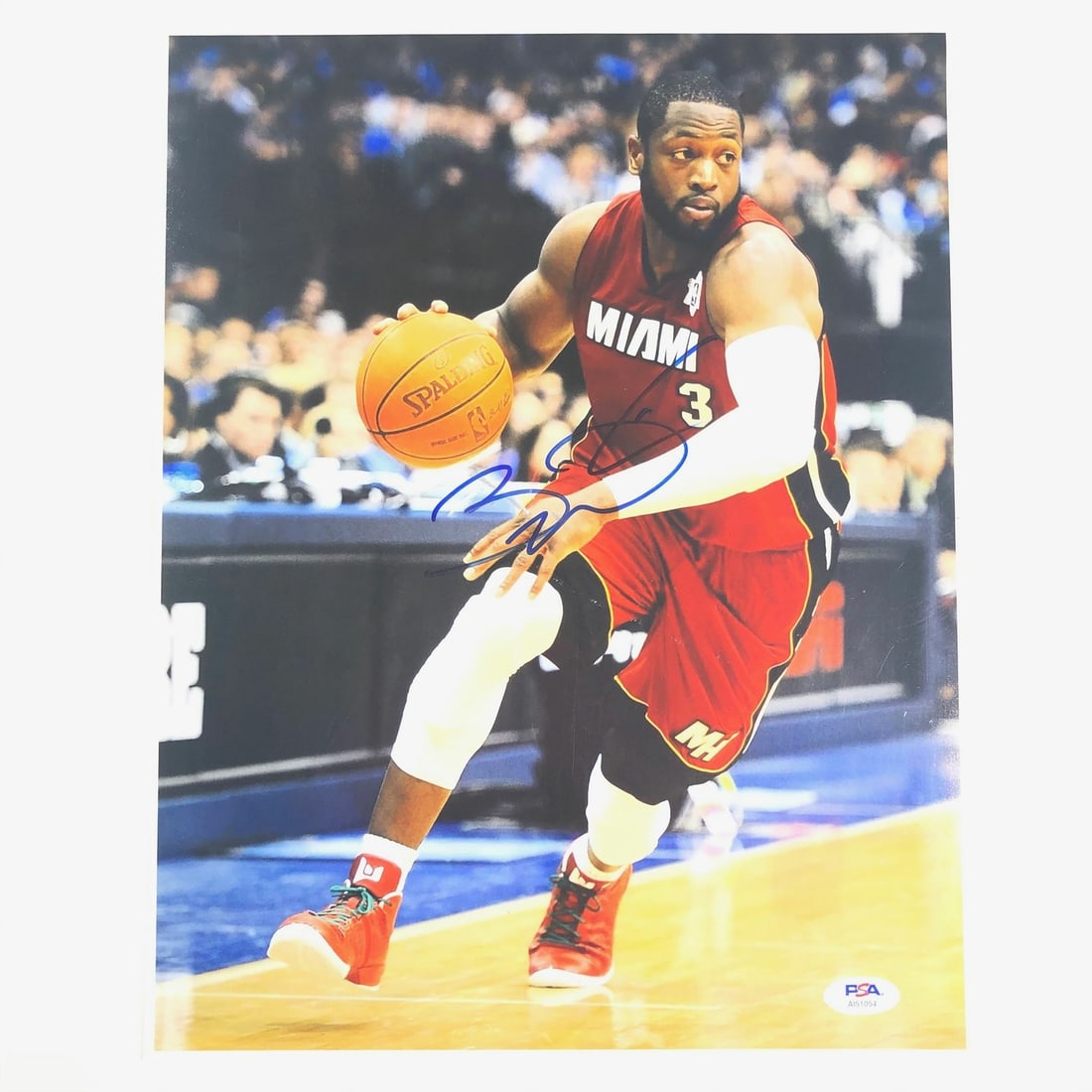 Dwyane Wade Autographed 11x14 Photo PSA/DNA Miami Heat Memorabilia: Dwyane Wade Autographed 11x14 Photo PSA/DNA Miami Heat Memorabilia This is a professionally printed 11x14 photograph featuring Dwyane Wade, a legendary player for the Miami Heat. The photograph is aut