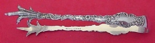 Durgin Watteau Sterling Silver Sugar Tong 4.5 Inch Monogrammed: Durgin Watteau Sterling Silver Sugar Tong 4.5 Inch Monogrammed This exquisite sugar tong is crafted from sterling silver and features the elegant Watteau pattern by Durgin. Measuring 4 1/2 inches in l