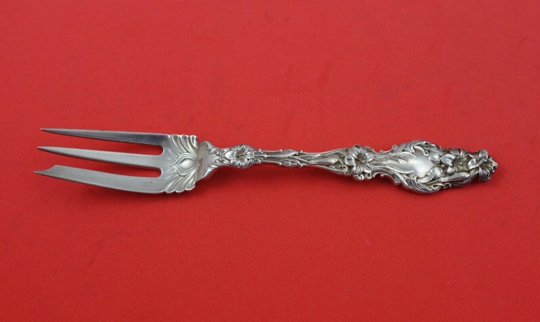 Whiting Lily Sterling Silver 3-Tine Pastry Fork 6 1/4 inches: Whiting Lily Sterling Silver 3-Tine Pastry Fork 6 1/4 inches This exquisite pastry fork from Whiting features the elegant "Lily" pattern, characterized by its intricate design. Made of high-quality st