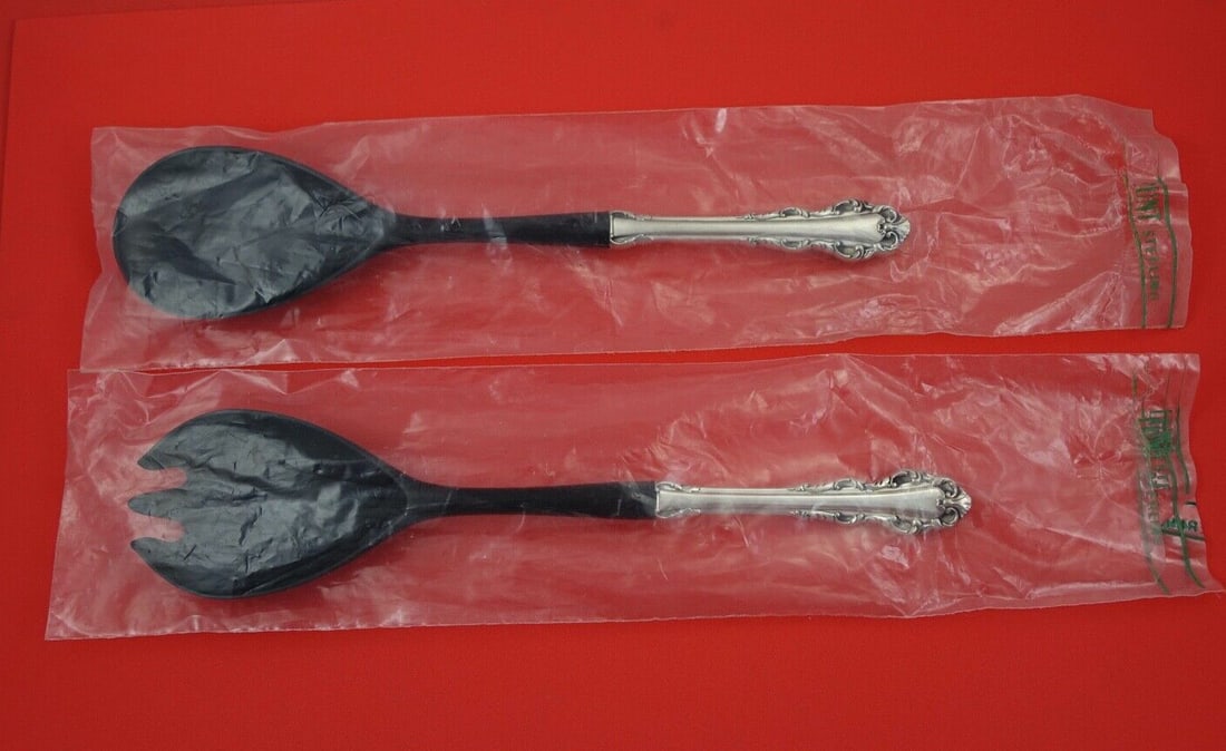 Lunt Sterling Silver Dresden Scroll Salad Serving Set 11": Lunt Sterling Silver Dresden Scroll Salad Serving Set 11" Elevate your dining experience with the Dresden Scroll Salad Serving Set by Lunt. This exquisite set features a sterling silver hollow handle