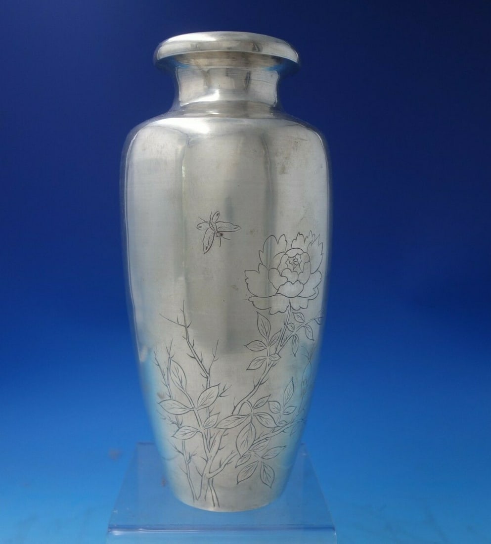 Japanese .950 Silver Vase Bright-Cut Chrysanthemum Butterfly 10 3/8": Japanese .950 Silver Vase Bright-Cut Chrysanthemum Butterfly 10 3/8" This exquisite Japanese vase is crafted from .950 silver and features a stunning bright-cut design with intricate chrysanthemum and