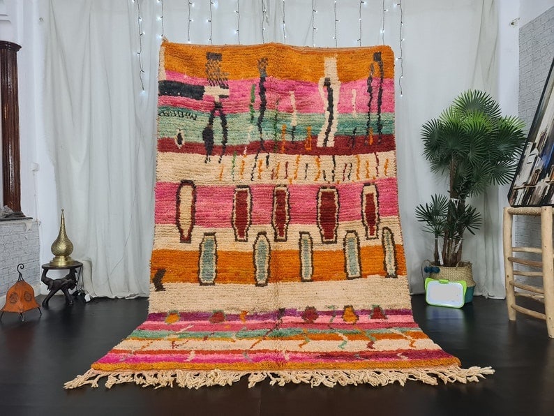 Handmade Moroccan Berber Wool Rug 10 x 5 Feet: Handmade Moroccan Berber Wool Rug 10 x 5 Feet Enhance your living space with this stunning Artistic Handmade Moroccan Berber Wool Rug. Handwoven by local Berber women in the Middle Atlas Mountains, th