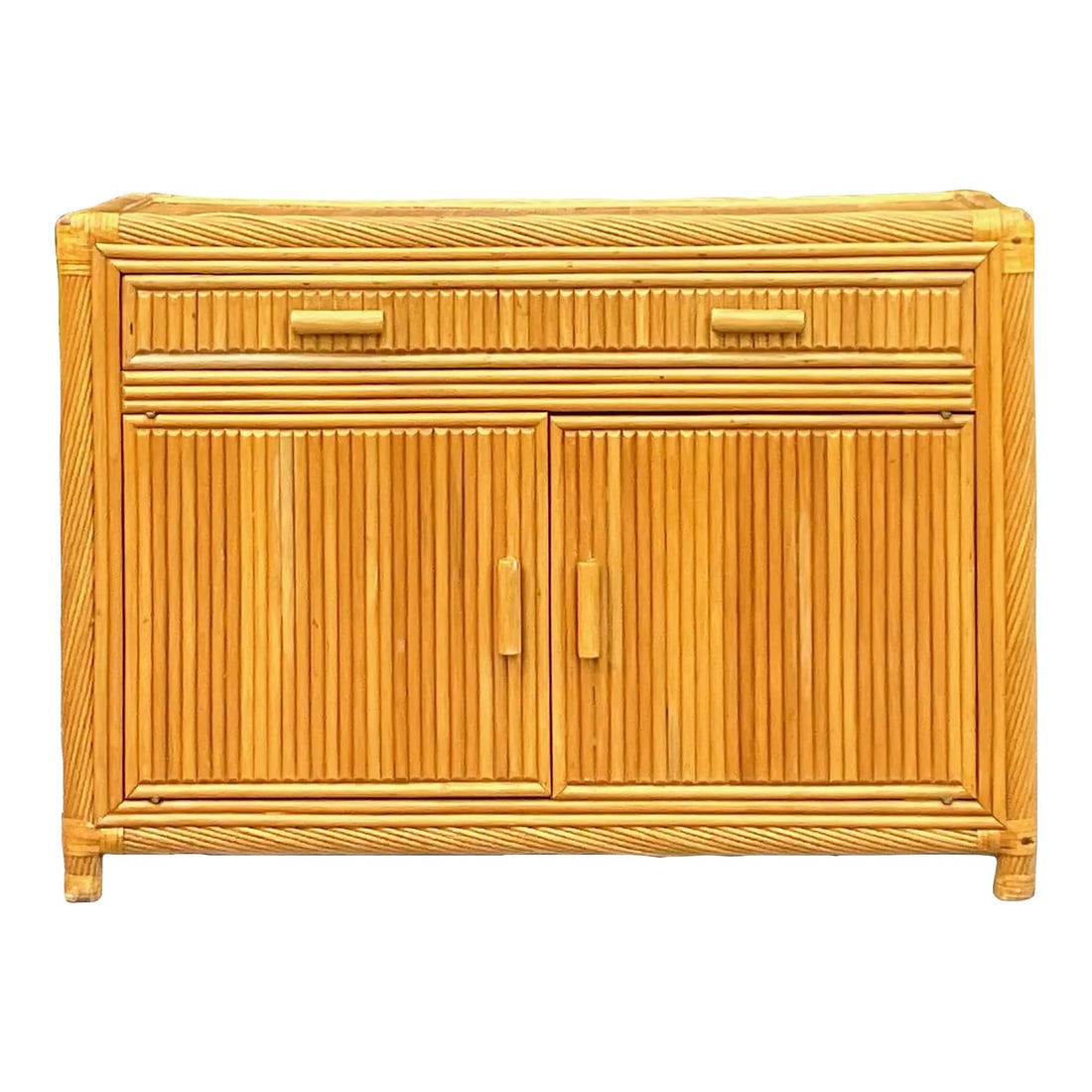 Vintage Coastal Bamboo Credenza with Rattan Top: Vintage Coastal Bamboo Credenza with Rattan Top This stunning late 20th-century vintage coastal credenza features a gorgeous golden split bamboo construction, accented by swirl detailed trim around th