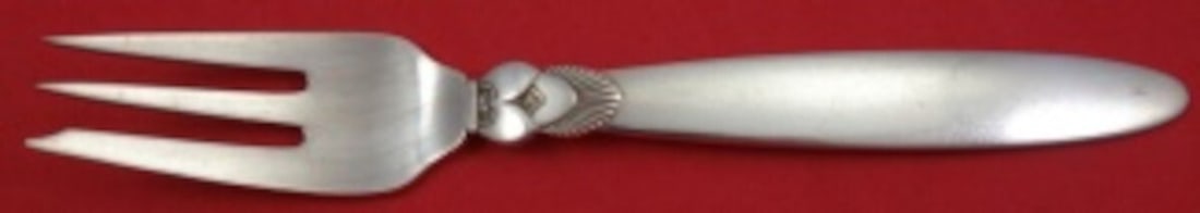 Georg Jensen Cactus Sterling Silver Pastry Fork GI/GJ 5 7/8": Georg Jensen Cactus Sterling Silver Pastry Fork GI/GJ 5 7/8" This exquisite pastry fork from the Cactus pattern, crafted by Georg Jensen, showcases the elegance of sterling silver design. Measuring 5