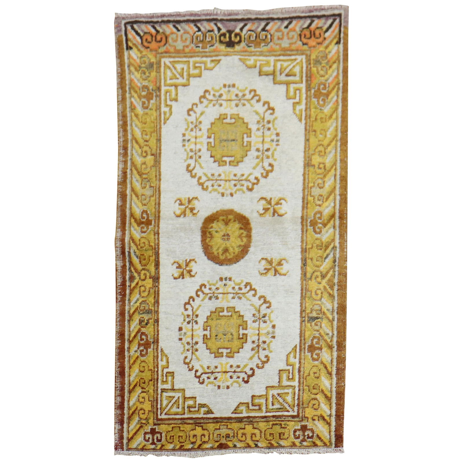 Bohemian Ivory Gold Antique Khotan Hand-Woven Rug 28 x 52: Bohemian Ivory Gold Antique Khotan Hand-Woven Rug 28 x 52 Add a touch of elegance to your space with this exquisite Ivory Gold Antique Khotan Scatter Rug. This stunning hand-woven rug, crafted from hi