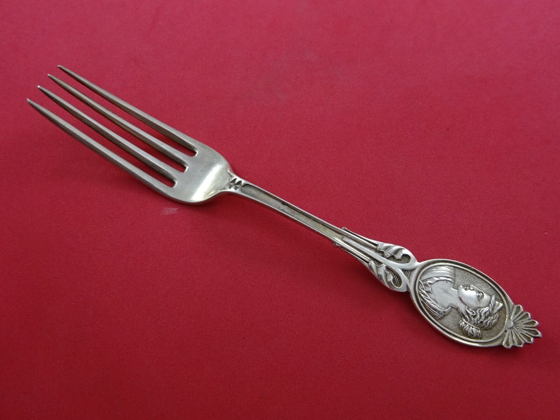 Wood and Hughes Medallion Diana Coin Silver Fork 7 inches Monogrammed: Wood and Hughes Medallion Diana Coin Silver Fork 7 inches Monogrammed Discover a stunning piece of history with this Medallion, also known as Diana, fork by Wood and Hughes. Crafted from coin silver,