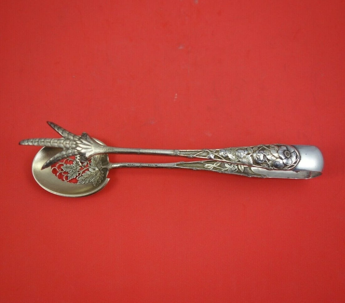 Gorham Eglantine Sterling Silver Ice Tong 8 3/8 Strawberry Claw Spoon: Gorham Eglantine Sterling Silver Ice Tong 8 3/8 Strawberry Claw Spoon Discover the elegance of the Eglantine Ice Tong by Gorham, crafted from high-quality sterling silver. This exquisite serving piece