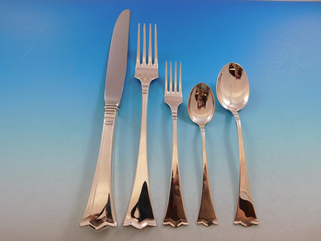 Th. Olsens Silver Crown 64-Piece Flatware Set in 830 Silver: Th. Olsens Silver Crown 64-Piece Flatware Set in 830 Silver Experience the elegance of Scandinavian design with this exquisite Silver Crown (Kronesolv) flatware set by Th. Olsens. Crafted from 830 sil