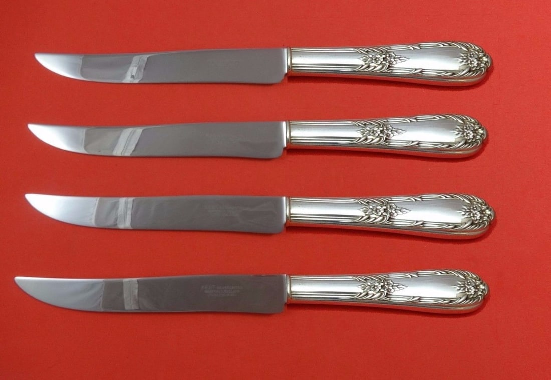 Texas Sized Splendor International Sterling Silver Steak Knife Set 4pc: Texas Sized Splendor International Sterling Silver Steak Knife Set 4pc Experience the elegance of dining with the Splendor by International Sterling Silver Steak Knife Set. This stunning 4-piece set f