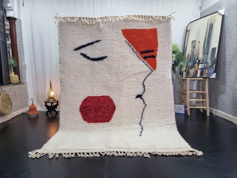 Handmade White Moroccan Berber Wool Area Rug 8 x 5 Feet: Handmade White Moroccan Berber Wool Area Rug 8 x 5 Feet Enhance your space with this Artistic Soft White Handmade Moroccan Berber Wool Area Rug. Skillfully handwoven by local Berber women in the Atlas