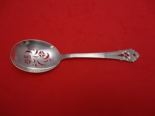 Orla Vagn Mogensen Greta Sterling Silver 9 1/4" Pierced Flower Pea Spoon: Orla Vagn Mogensen Greta Sterling Silver 9 1/4" Pierced Flower Pea Spoon Introducing the Greta pattern serving spoon by Orla Vagn Mogensen, crafted from high-quality sterling silver. This exquisite pe