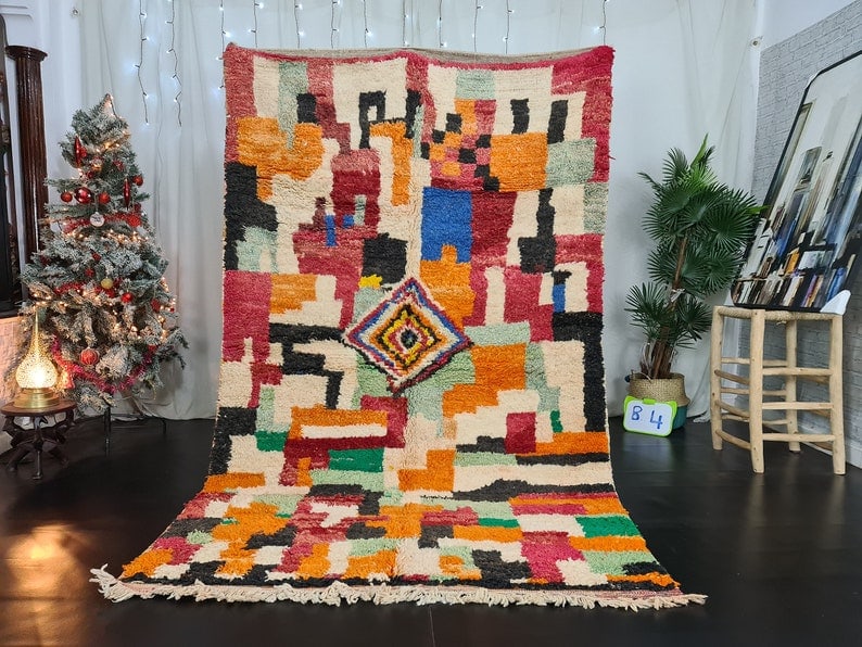 Handmade Colorful Moroccan Berber Wool Rug 10 x 5 Feet: Handmade Colorful Moroccan Berber Wool Rug 10 x 5 Feet Discover the beauty of this authentic, colorful handmade Moroccan Berber wool rug. Handwoven by local Berber women weavers in the Middle Atlas Mo