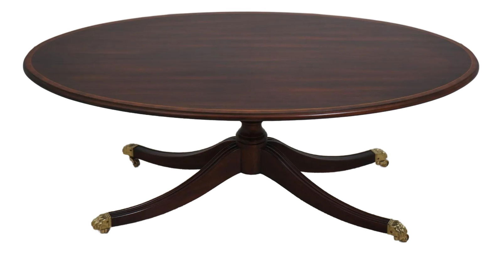 Henkel Harris Mahogany Cocktail Table with Duncan Phyfe Base: Henkel Harris Mahogany Cocktail Table with Duncan Phyfe Base This elegant Henkel Harris elliptical coffee cocktail table showcases exquisite craftsmanship with its traditional Duncan Phyfe pedestal ba