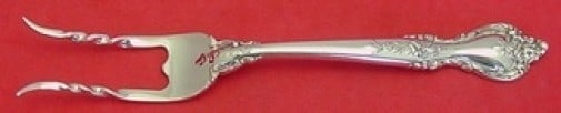 Lunt Belvedere Sterling Silver Custom Baked Potato Fork 7.5": Lunt Belvedere Sterling Silver Custom Baked Potato Fork 7.5" Introducing the Belvedere by Lunt Sterling Silver Baked Potato Fork, a beautifully crafted serving fork measuring 7 1/2 inches in length. T