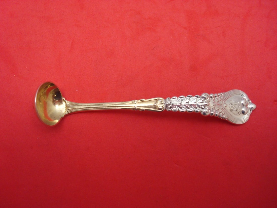 Tiffany & Co. Florentine Sterling Silver Mustard Ladle Goldwashed 4.5": Tiffany & Co. Florentine Sterling Silver Mustard Ladle Goldwashed 4.5" This exquisite mustard ladle from Tiffany & Co. features the elegant Florentine pattern, crafted from sterling silver and enhance