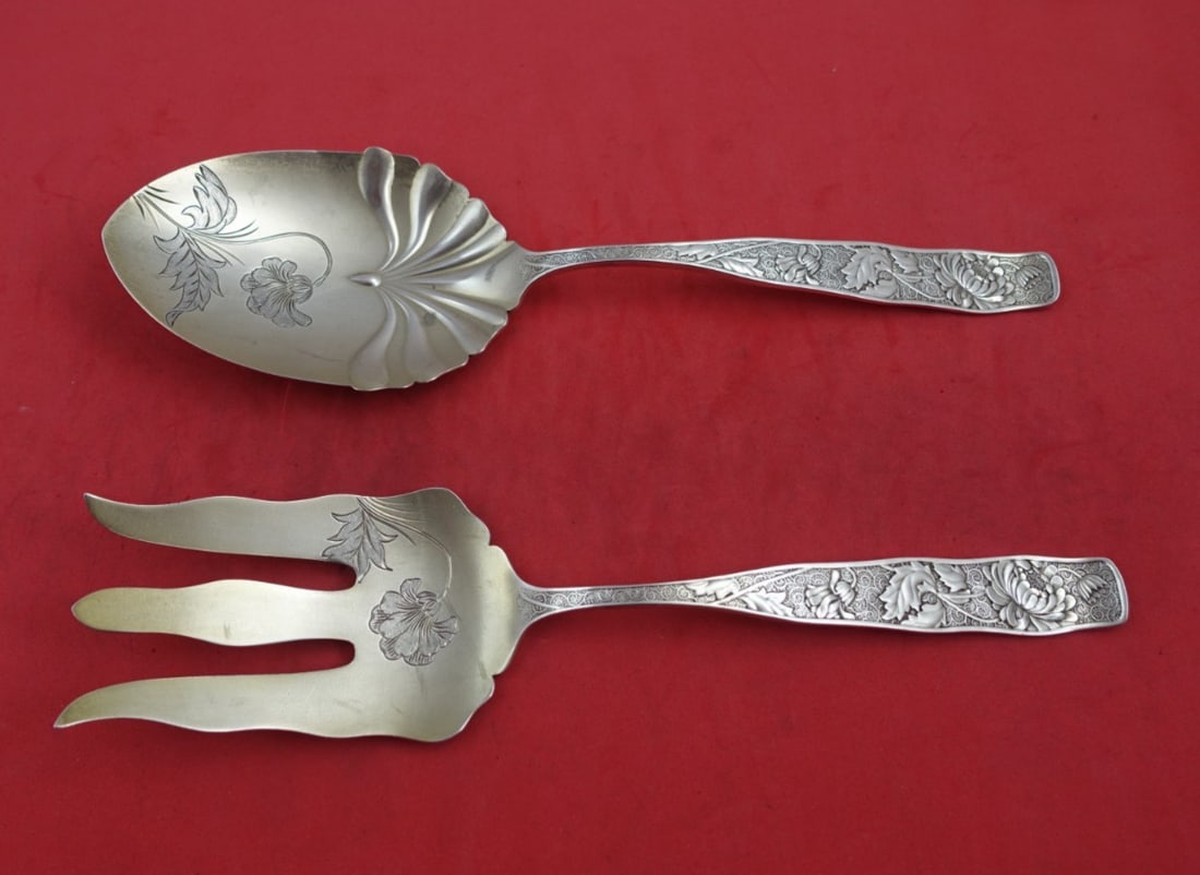 Towle Sterling Silver Orchids 2pc Salad Serving Set 9in: Towle Sterling Silver Orchids 2pc Salad Serving Set 9in Enhance your dining experience with this exquisite 2-piece Salad Serving Set from Towle, featuring the elegant Orchids pattern. Crafted from hig