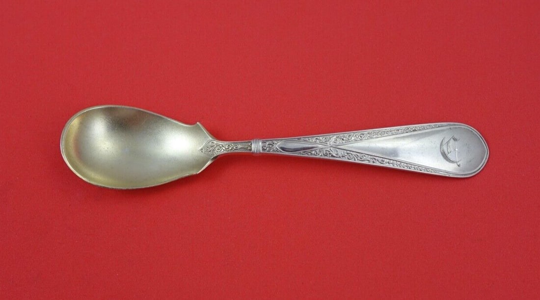 Gorham Eva Sterling Silver Ice Cream Spoon Gold Wash 5 3/8": Gorham Eva Sterling Silver Ice Cream Spoon Gold Wash 5 3/8" This elegant ice cream spoon from Gorham's 'Eva' pattern is crafted from high-quality sterling silver, measuring 5 3/8" in length. The spoon