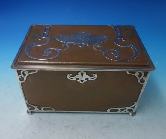 Gorham Athenic Sterling Silver Copper Humidor with Key 6.5" Tall: Gorham Athenic Sterling Silver Copper Humidor with Key 6.5" Tall Discover the exquisite Athenic by Gorham Sterling Silver and Copper Humidor, a remarkable piece crafted between 1900 and 1940. This vin