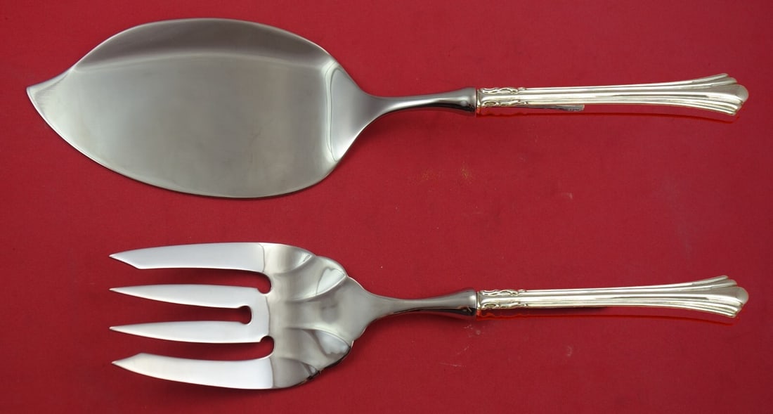 Reed & Barton Eighteenth Century Sterling Silver Salmon Serving Set 2-Piece: Reed & Barton Eighteenth Century Sterling Silver Salmon Serving Set 2-Piece This exquisite two-piece salmon serving set, crafted by Reed & Barton, showcases the elegant Eighteenth Century pattern. Mad